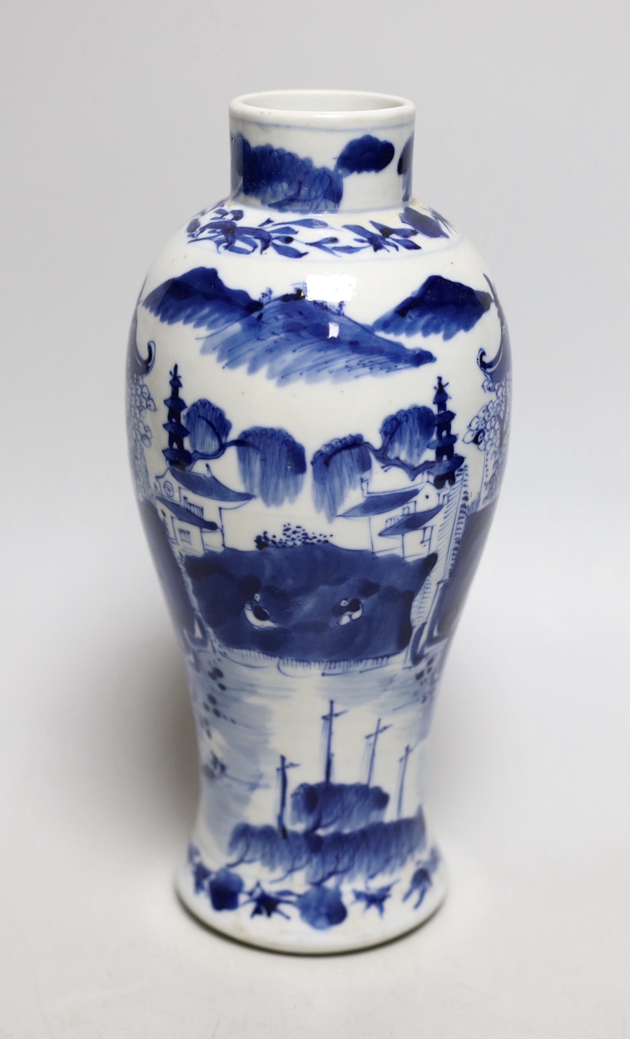 A 19th century Chinese blue and white baluster vase, 23cms high
